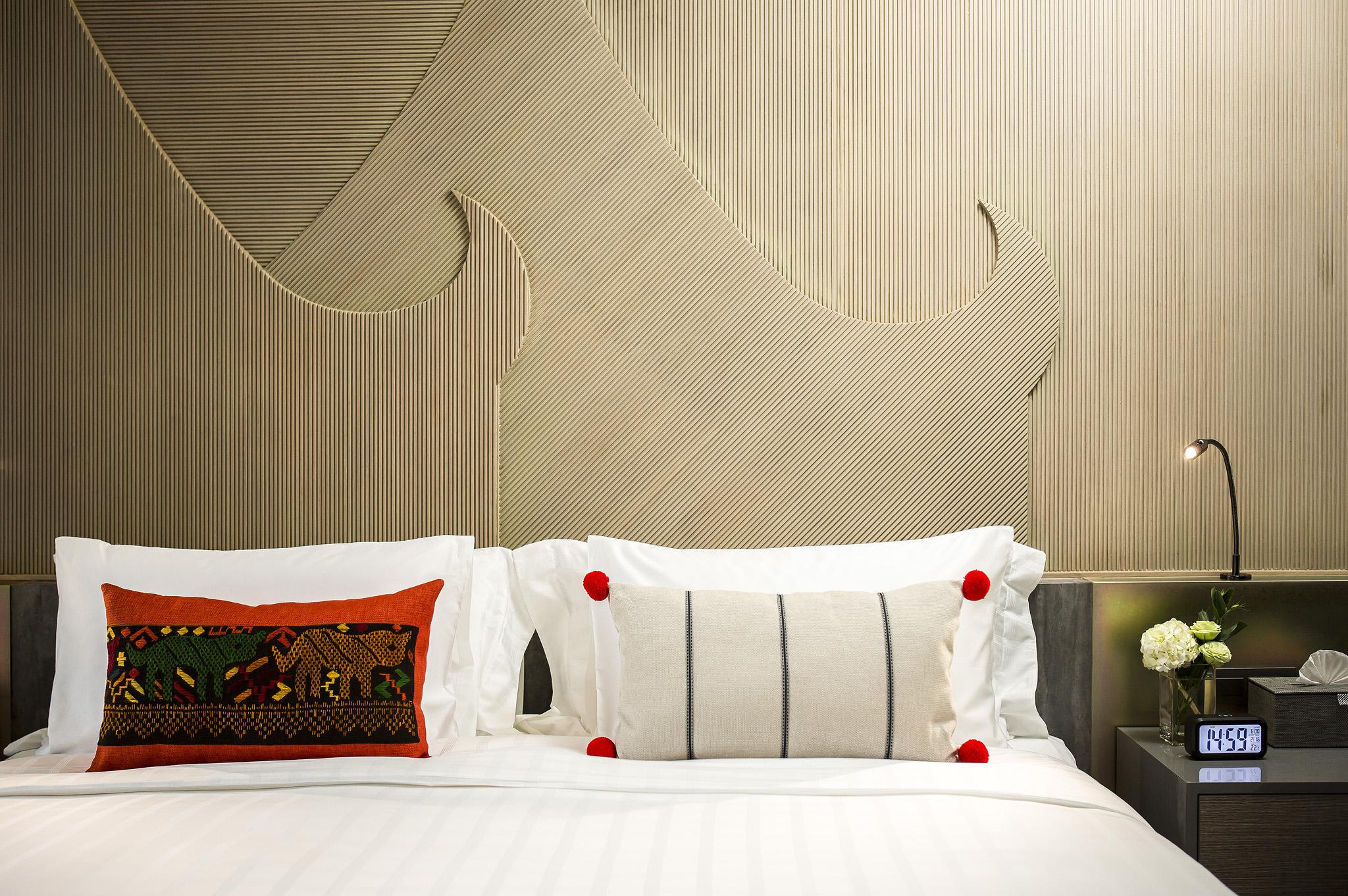 U Nimman Chiang Mai Ξενοδοχείο Εξωτερικό φωτογραφία A bed with cushions