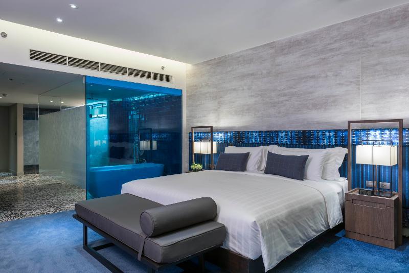 U Nimman Chiang Mai Ξενοδοχείο Εξωτερικό φωτογραφία A bedroom at the hotel